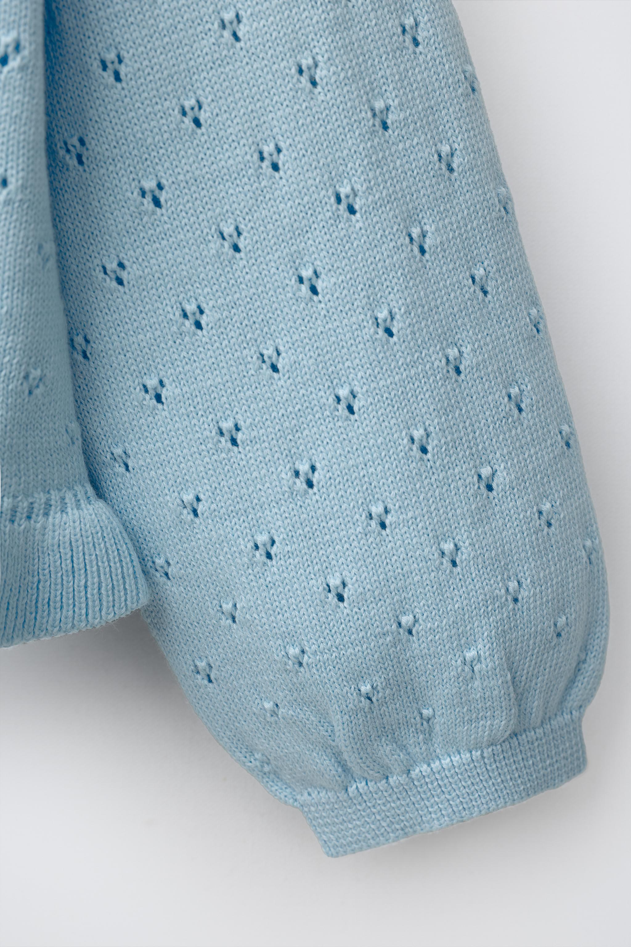 GILET EN MAILLE BRODÉ MIFFY™ MERCIS BV ©
